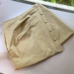 Beige vegan leather skirt.